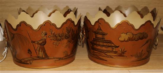 A set of four brown and gold toleware style planters